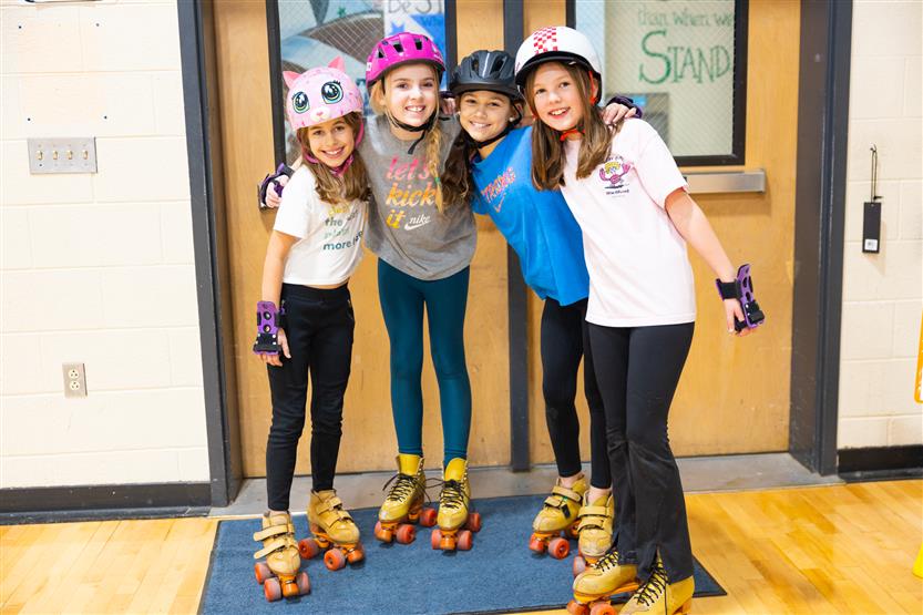 Lipscomb Elementary students skate in PE